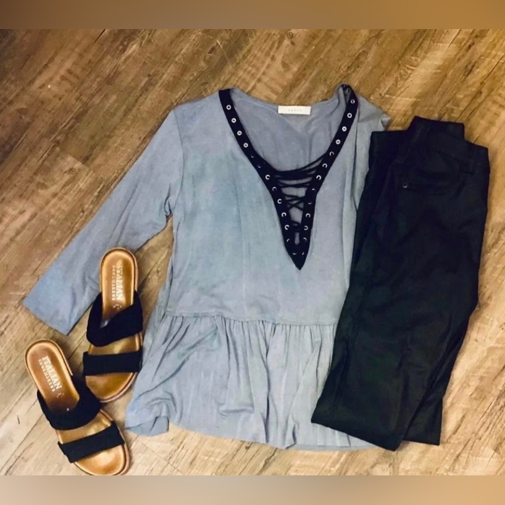 Peplum top with laced neckline